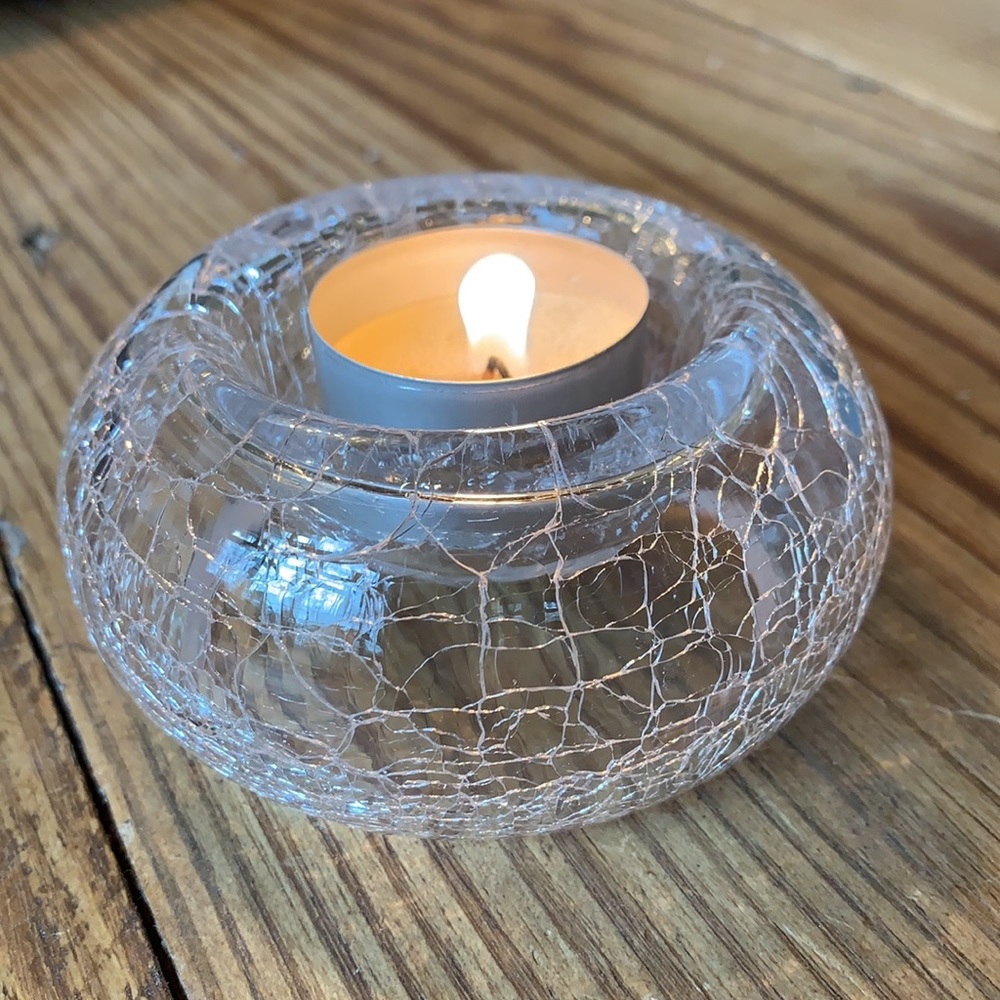 NWOT Clear glass votive candle holder.